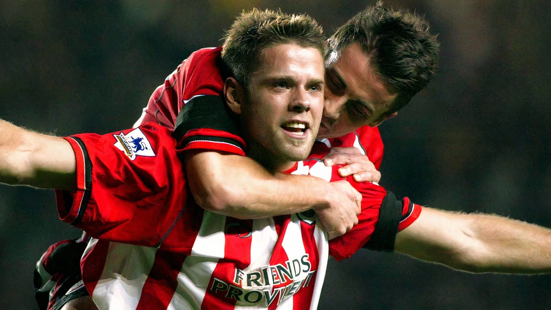 James Beattie ăn mừng bàn thắng thời thi đấu ở Premier League, tượng trưng cho kinh nghiệm săn bàn đưa vào công tác huấn luyện